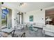 Spacious living room with floor-to-ceiling windows and city views at 750 Park Ne Ave # 6S, Atlanta, GA 30326