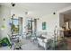 Bright living room with white sofas, glass tables, and city views at 750 Park Ne Ave # 6S, Atlanta, GA 30326