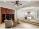 Bedroom with a large window and built-in entertainment center at 10955 Stroup Rd, Roswell, GA 30075