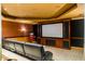 Home theater with large screen and comfortable seating at 10955 Stroup Rd, Roswell, GA 30075