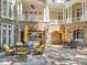 Spacious stone patio with multiple seating areas at 10955 Stroup Rd, Roswell, GA 30075