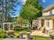 Landscaped backyard oasis with a pool and pergola at 10955 Stroup Rd, Roswell, GA 30075