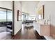 Bright hallway with hardwood floors and modern wall art at 3344 Peachtree Ne Rd # 3902, Atlanta, GA 30326