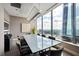 Modern conference room with large glass table and city views at 3344 Peachtree Ne Rd # 3902, Atlanta, GA 30326