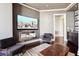Media room with large TV, fireplace and comfortable seating at 3344 Peachtree Ne Rd # 3902, Atlanta, GA 30326