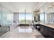 Luxury bathroom with marble floors and a large shower at 3344 Peachtree Ne Rd # 3902, Atlanta, GA 30326