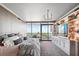 Bright bedroom with city views, built-in shelves, and large windows at 3344 Peachtree Ne Rd # 3902, Atlanta, GA 30326