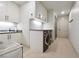 Convenient laundry room with washer, dryer, and ample storage at 3344 Peachtree Ne Rd # 3902, Atlanta, GA 30326