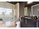 Modern bathroom with a glass shower and soaking tub at 3344 Peachtree Ne Rd # 3902, Atlanta, GA 30326