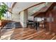 Elegant lobby with grand piano, hardwood floors, and modern staircase at 3344 Peachtree Ne Rd # 3902, Atlanta, GA 30326