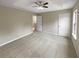 Spacious main bedroom with carpet and ensuite bath access at 3316 Merlot Pass, Lawrenceville, GA 30044