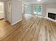 Spacious living room with fireplace and access to backyard at 3316 Merlot Pass, Lawrenceville, GA 30044