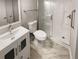 Updated bathroom with a walk-in shower and marble floor at 3316 Merlot Pass, Lawrenceville, GA 30044