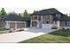 Modern home with stone and gray siding, three-car garage, and landscaping at 1527 Adora Ln, Duluth, GA 30097
