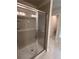 Bathroom with shower, double vanity, and granite countertop at 2270 Highridge Point Dr, Lithia Springs, GA 30122