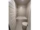 Clean bathroom with tub, shower, and glass shelving at 2270 Highridge Point Dr, Lithia Springs, GA 30122