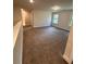 Bonus room features carpet flooring and multiple windows at 2270 Highridge Point Dr, Lithia Springs, GA 30122