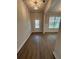 Bright entryway with hardwood floors and neutral paint at 2270 Highridge Point Dr, Lithia Springs, GA 30122