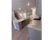 Modern kitchen with gray cabinets, granite counters, and island at 2270 Highridge Point Dr, Lithia Springs, GA 30122