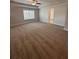 Large main bedroom with carpeted floors and ensuite bathroom access at 2270 Highridge Point Dr, Lithia Springs, GA 30122