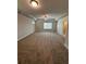 Spacious main bedroom with carpeted floor, ceiling fan and large window at 2270 Highridge Point Dr, Lithia Springs, GA 30122