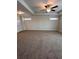 Main bedroom with carpeted floor and two windows, offering natural light at 2270 Highridge Point Dr, Lithia Springs, GA 30122