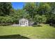 Large backyard with shed and chicken coop at 1018 Emory St, Oxford, GA 30054