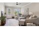 Relaxing living room with sectional sofa and plenty of natural light at 5158 Noble Village Way # 35, Lilburn, GA 30047