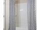 Clean bathroom with white subway tile and shower/tub at 5158 Noble Village Way # 35, Lilburn, GA 30047