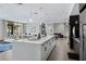 Large kitchen island with barstools, in community space at 775 Juniper Ne St # 107, Atlanta, GA 30308