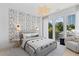 Spacious bedroom with stylish decor and private balcony at 775 Juniper Ne St # 107, Atlanta, GA 30308