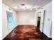 Living room with hardwood floors and large window at 8740 Roswell Rd # 9D, Atlanta, GA 30350