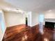Hardwood floors and access to kitchen and other rooms at 8740 Roswell Rd # 9D, Atlanta, GA 30350