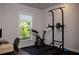 Home gym with exercise bike, pull-up bar, and plenty of space at 517 Whitlox Nw Rd, Atlanta, GA 30318