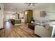 Open concept living room with hardwood floors and view to the kitchen at 517 Whitlox Nw Rd, Atlanta, GA 30318