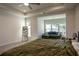 Main bedroom with sitting area and large bed at 517 Whitlox Nw Rd, Atlanta, GA 30318