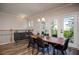 Bright dining room with balcony access and hardwood floors at 517 Whitlox Nw Rd, Atlanta, GA 30318