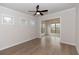 Spacious bedroom with hardwood floors and a ceiling fan at 2431 Siskin Square Rd, Duluth, GA 30096