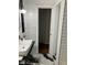 Bathroom with black and white marble floor and subway tile at 1433 Woodland Sw Ter, Atlanta, GA 30311