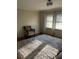 Bright living room featuring hardwood floors and large windows at 1433 Woodland Sw Ter, Atlanta, GA 30311