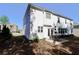 Rear view of house with patio and yard at 2532 Ozella Sw Pl, Atlanta, GA 30331