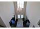 Elegant two-story entryway with chandelier and double doors at 2532 Ozella Sw Pl, Atlanta, GA 30331