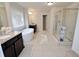 Large bathroom with soaking tub, double vanity, and shower at 2532 Ozella Sw Pl, Atlanta, GA 30331