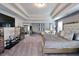 Spacious main bedroom with king bed and sitting area at 2532 Ozella Sw Pl, Atlanta, GA 30331