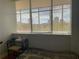 Bedroom with large window offering scenic city views at 3060 Pharr Court North Nw # 609, Atlanta, GA 30305