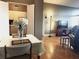 Bright dining area with hardwood floors and view into the kitchen at 3060 Pharr Court North Nw # 609, Atlanta, GA 30305
