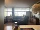 Living room with hardwood floors, large windows, and city views at 3060 Pharr Court North Nw # 609, Atlanta, GA 30305