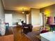 Spacious living room with hardwood floors, comfortable seating, and city views at 3060 Pharr Court North Nw # 609, Atlanta, GA 30305