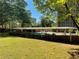 Relaxing pool area with a large deck and trees at 3060 Pharr Court North Nw # 609, Atlanta, GA 30305