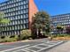 Brick apartment building with landscaping and parking at 3060 Pharr Court North Nw # 609, Atlanta, GA 30305